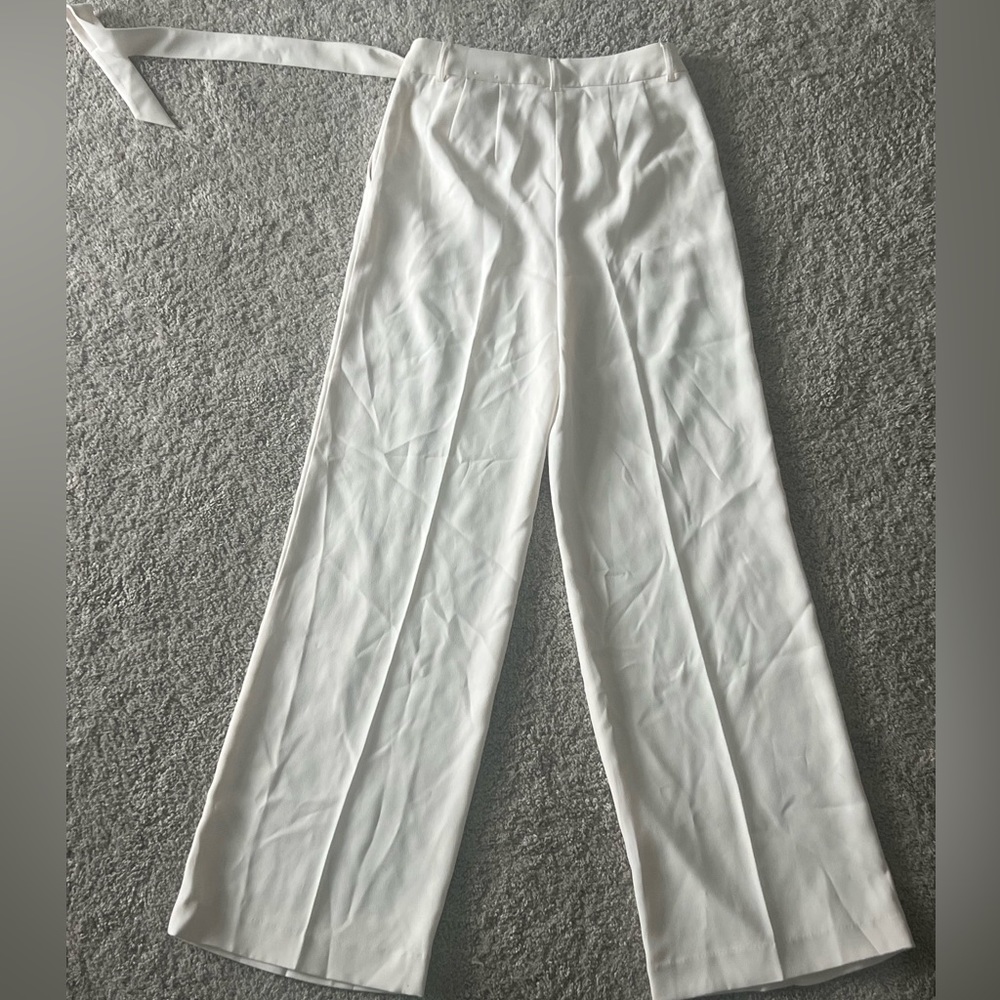 Cream wide leg trousers, polyester but still light, belt